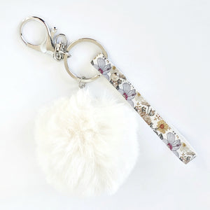 Zinnia Slim Wristlet Key Chain With Pompom